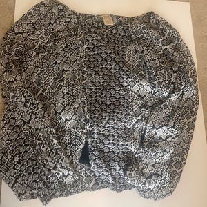 Patterned long sleeve with tassels